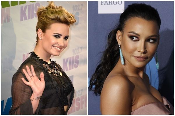 A cantora Demi Lovato (D) e seu par romntico na srie Glee, Naya Rivera ( Frazer Harrison/Getty Images/AFP, REUTERS/Jonathan Alcorn)